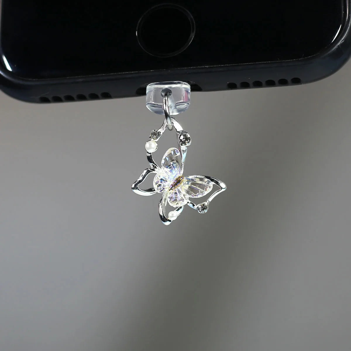 Tapón de polvo de perlas de mariposa y diamantes