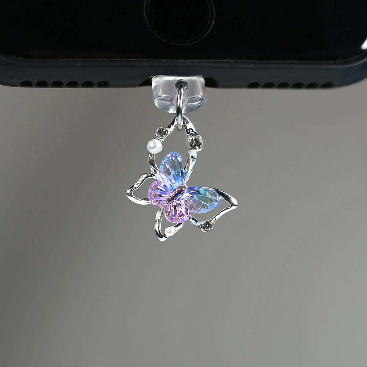Tapón de polvo de perlas de mariposa y diamantes