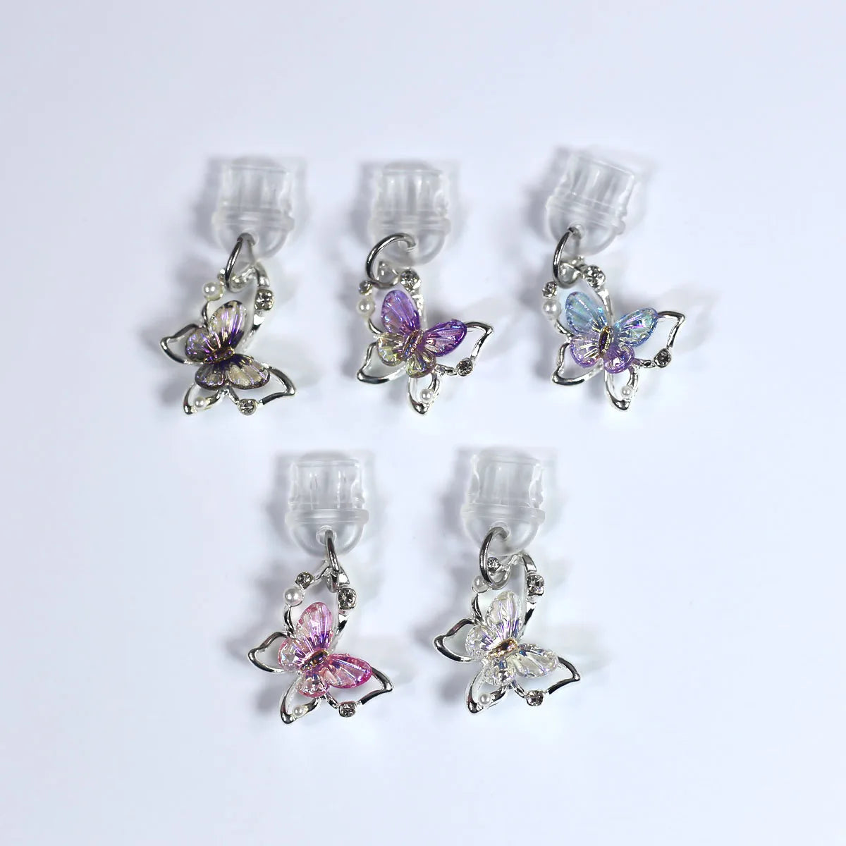 Tapón de polvo de perlas de mariposa y diamantes
