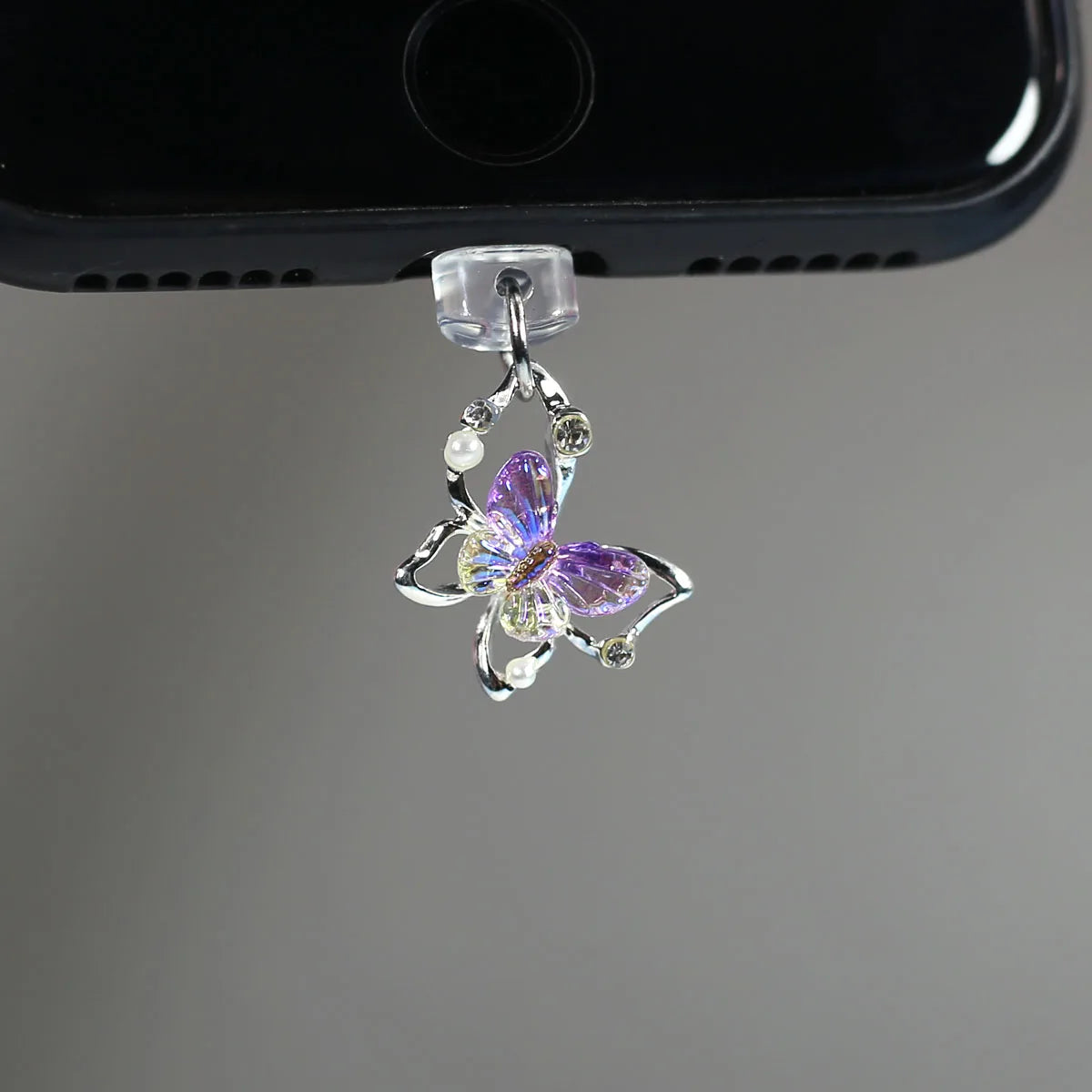 Tapón de polvo de perlas de mariposa y diamantes