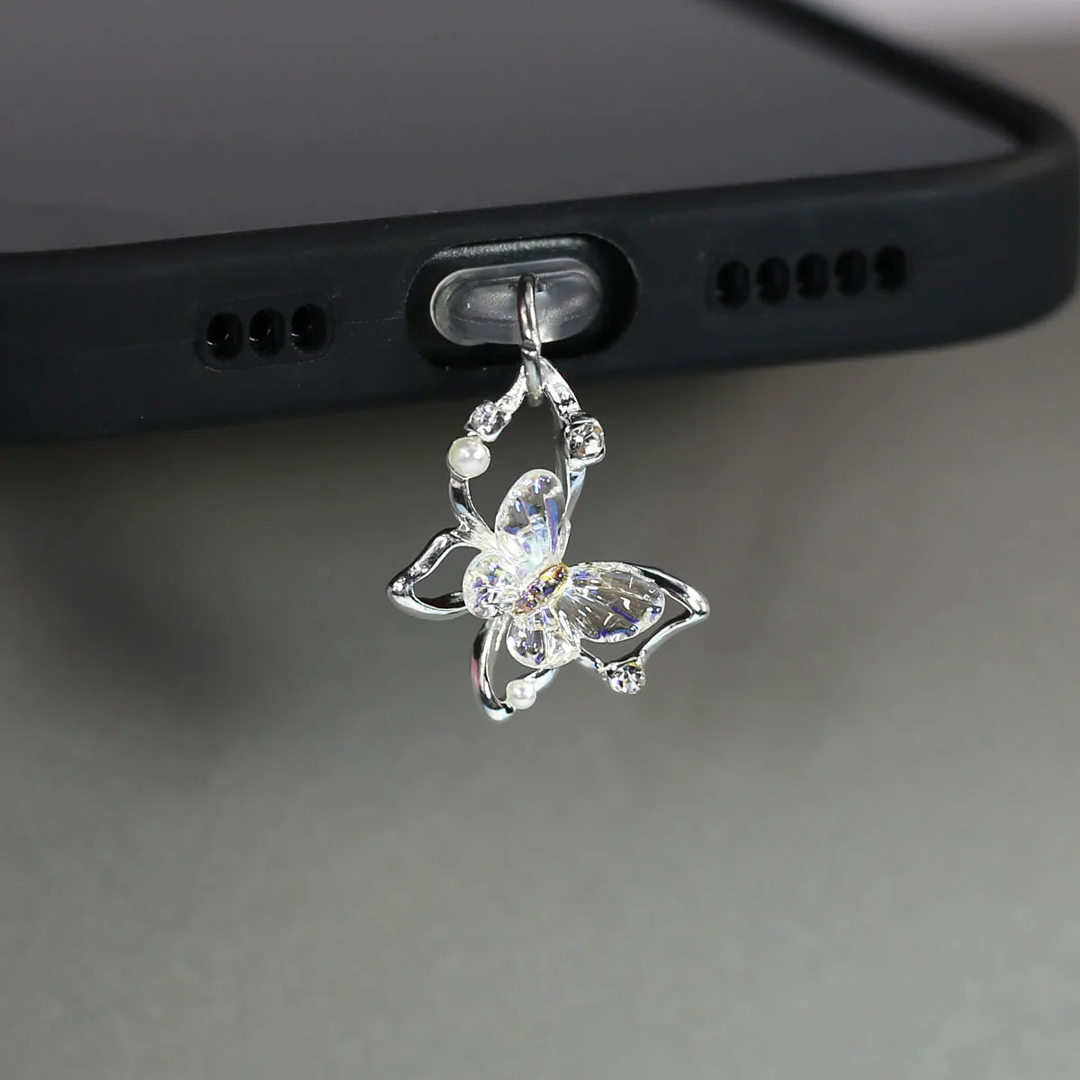 Tapón de polvo de perlas de mariposa y diamantes