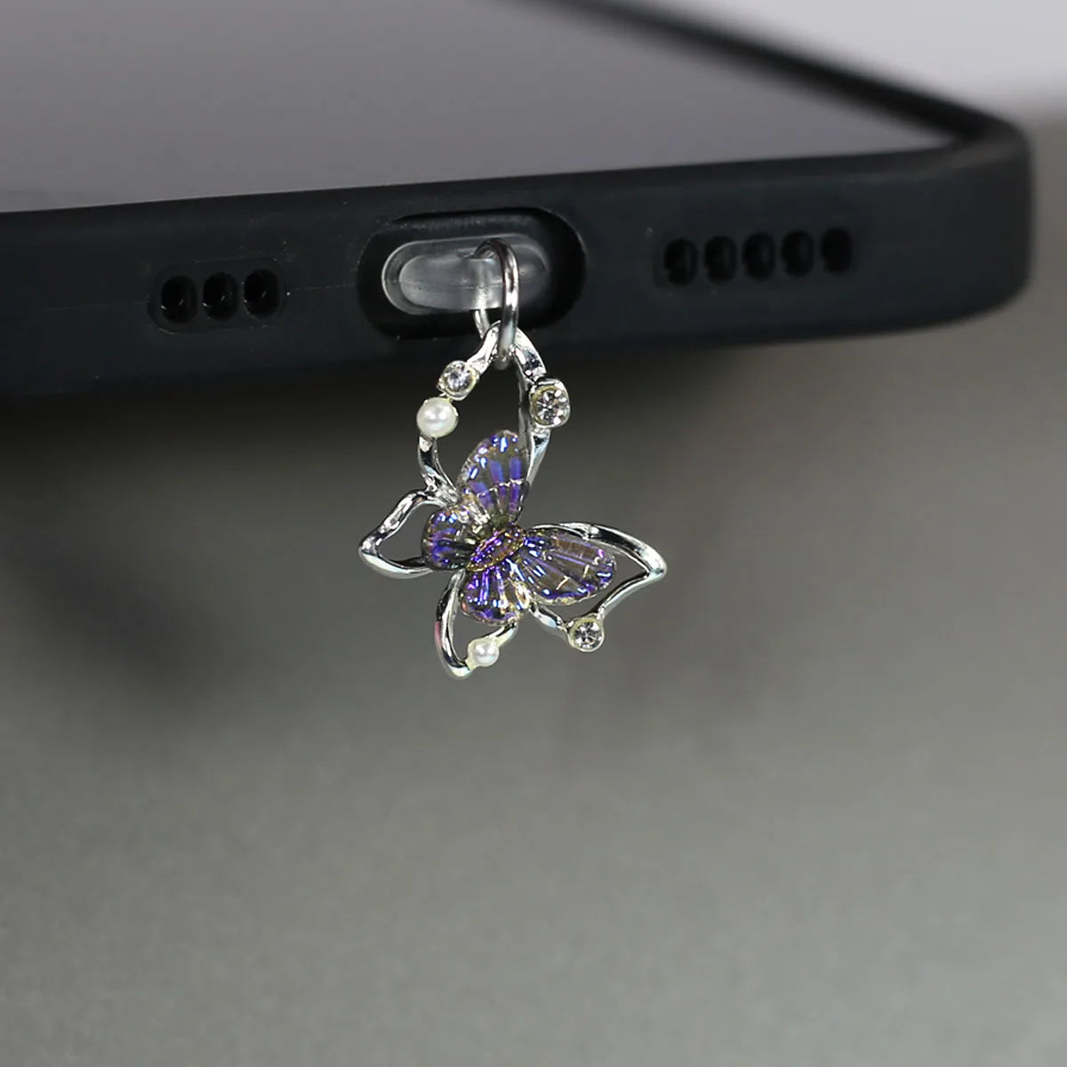 Tapón de polvo de perlas de mariposa y diamantes